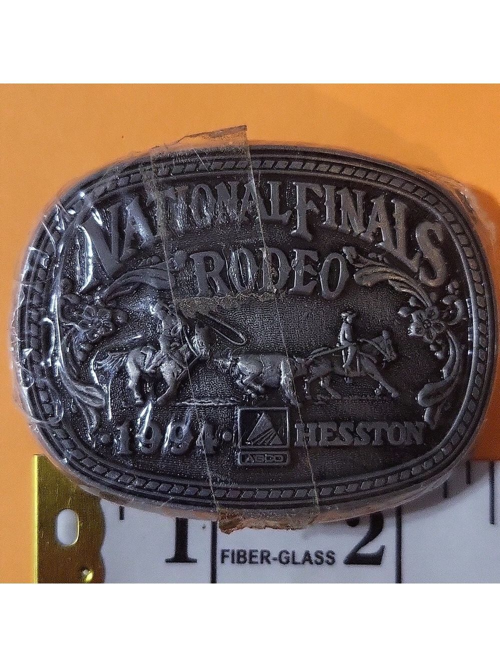 HESSTON NATIONAL FINALS RODEO KIDS BELT BUCKLE 1994